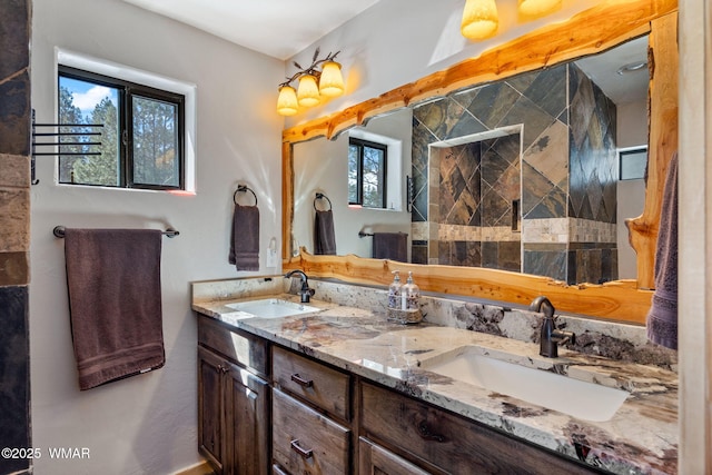 bathroom featuring double vanity and a sink