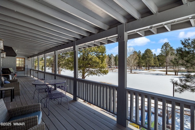 wooden terrace featuring area for grilling