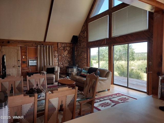 1949 Norton Pl, Show Low, AZ 85901 - living area with a wood stove, high vaulted ceiling, cooling unit, wood finished floors, and wood walls