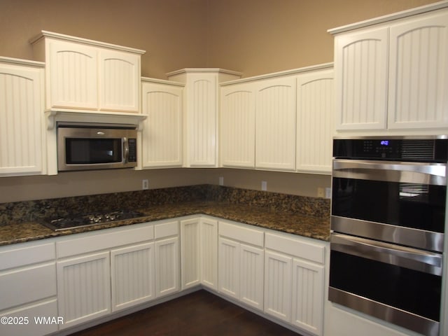2124 W Vista Dr, Snowflake, AZ 85937 - kitchen featuring dark stone counters, white cabinets, and stainless steel appliances