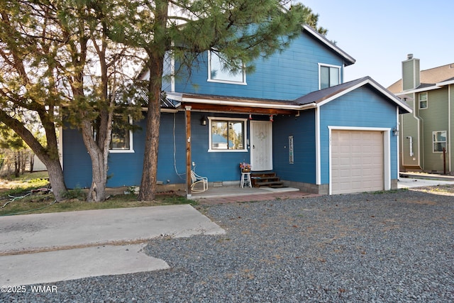 1275 Flag Hollow Rd, Lakeside, AZ 85929 - traditional home featuring a garage and entry steps