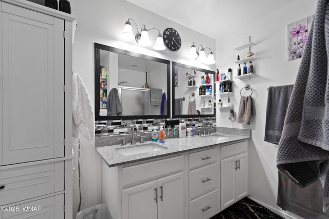1275 Flag Hollow Rd, Lakeside, AZ 85929 - bathroom with a stall shower, double vanity, and backsplash
