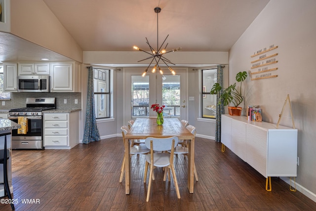 1421 N 36th Dr, Show Low, AZ 85901 - dining area with baseboards, dark wood-style flooring, and a chandelier