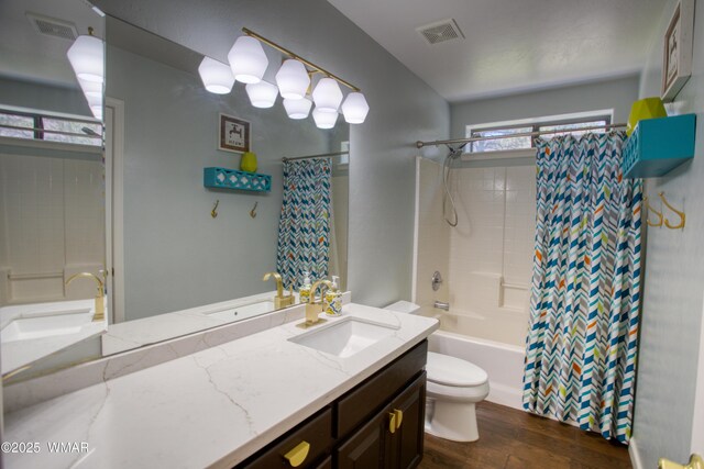 1421 N 36th Dr, Show Low, AZ 85901 - bathroom featuring toilet, vanity, shower / bath combination with curtain, and wood finished floors