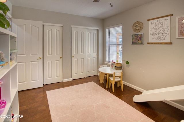 1421 N 36th Dr, Show Low, AZ 85901 - interior space featuring baseboards, dark wood finished floors, and a ceiling fan