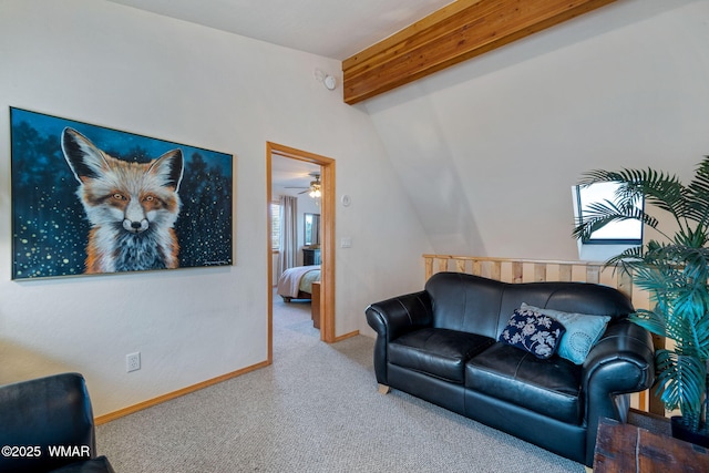 1513 Low Mountain Trl, Heber, AZ 85928 - carpeted living room featuring vaulted ceiling with beams, ceiling fan, and baseboards