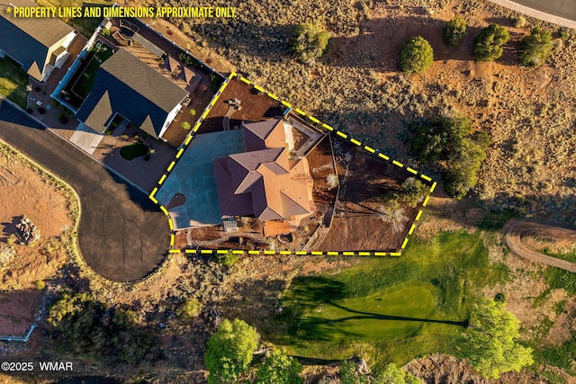 aerial view of property and surrounding area with property boundaries highlighted