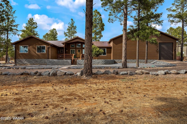 2737 Skyhawk Dr, Overgaard, AZ 85933 - single story home featuring metal roof and driveway