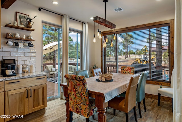 2737 Skyhawk Dr, Overgaard, AZ 85933 - dining area featuring light wood finished floors, visible vents, and recessed lighting