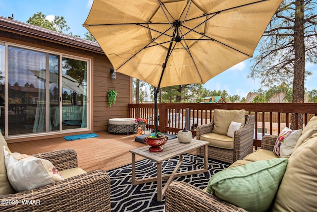 2737 Skyhawk Dr, Overgaard, AZ 85933 - wooden terrace featuring an outdoor living space