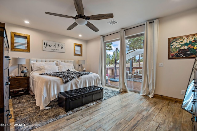 2737 Skyhawk Dr, Overgaard, AZ 85933 - bedroom with access to outside, visible vents, recessed lighting, wood finished floors, and baseboards