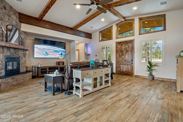 2737 Skyhawk Dr, Overgaard, AZ 85933 - kitchen with beam ceiling, a ceiling fan, wood finished floors, and a healthy amount of sunlight
