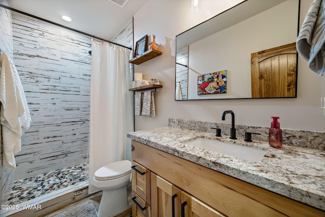 2737 Skyhawk Dr, Overgaard, AZ 85933 - bathroom with vanity, a stall shower, and toilet