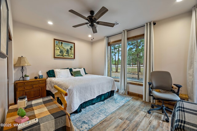 2737 Skyhawk Dr, Overgaard, AZ 85933 - bedroom with light wood-style flooring, a ceiling fan, visible vents, recessed lighting, and baseboards