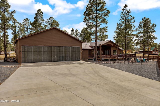 2737 Skyhawk Dr, Overgaard, AZ 85933 - chalet / cabin with fence and a garage