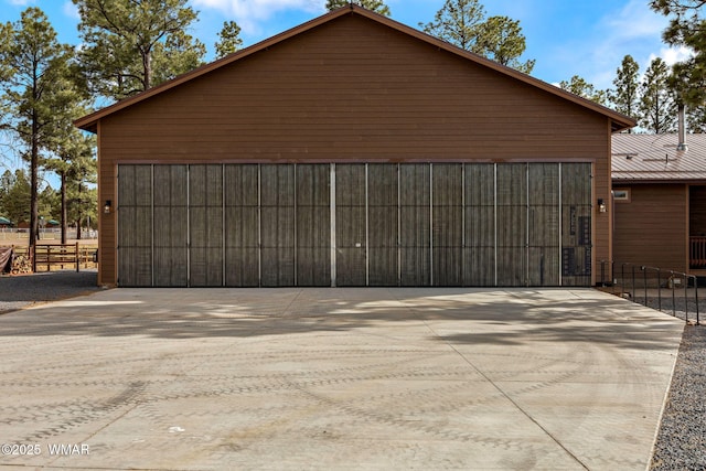 2737 Skyhawk Dr, Overgaard, AZ 85933 - garage featuring fence and concrete driveway