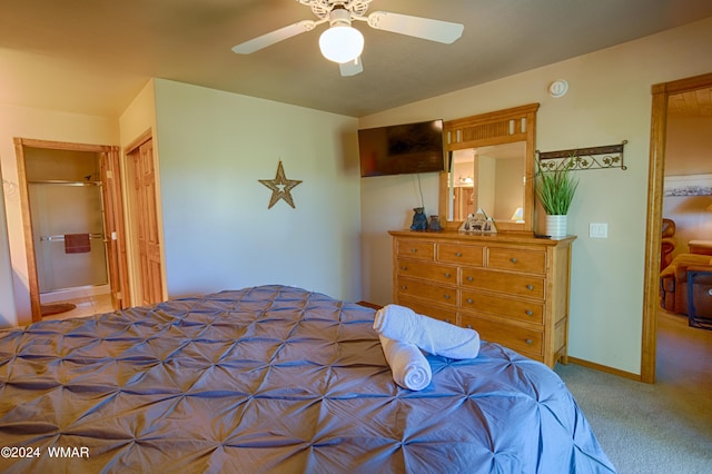 bedroom featuring a ceiling fan, light carpet, and baseboards