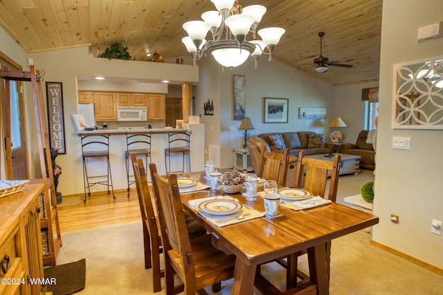 dining room with light carpet, baseboards, wood ceiling, vaulted ceiling, and ceiling fan with notable chandelier