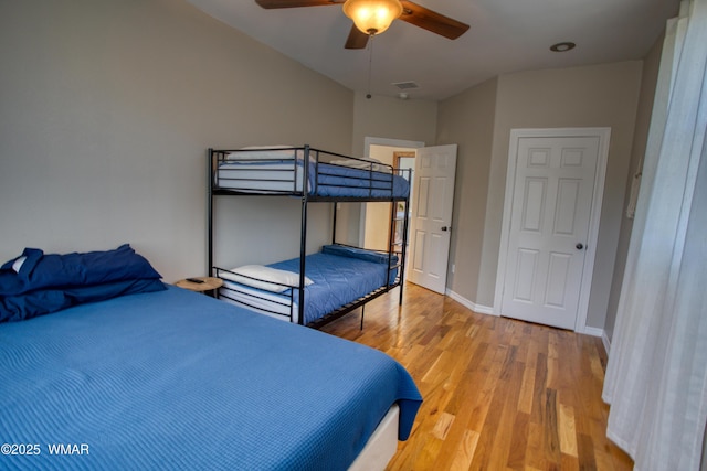 4701 S Manzanita Way, Show Low, AZ 85901 - bedroom with wood finished floors, baseboards, and ceiling fan