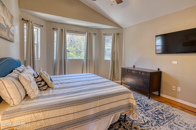 4701 S Manzanita Way, Show Low, AZ 85901 - bedroom with vaulted ceiling, wood finished floors, baseboards, and a ceiling fan