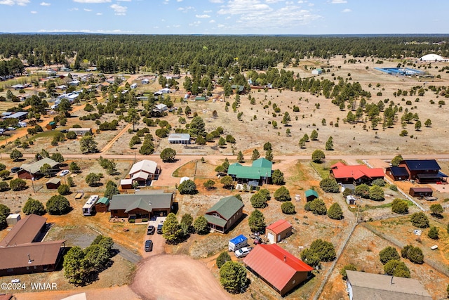 aerial view featuring a forest view