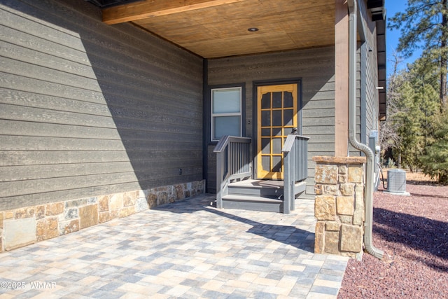 doorway to property featuring a patio