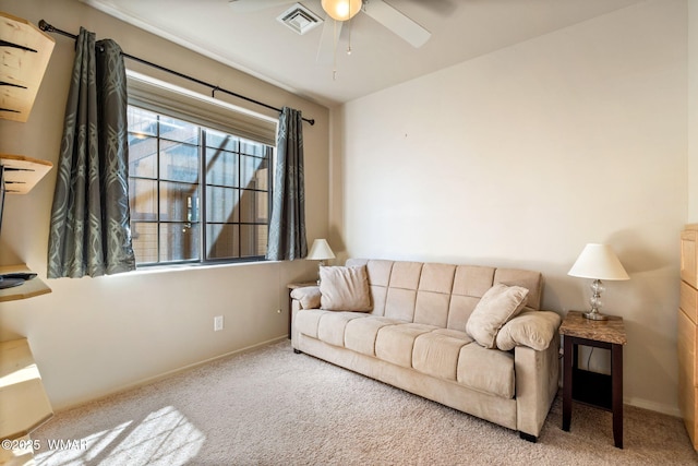 2411 Quarter Horse Trl, Overgaard, AZ 85933 - carpeted living area featuring visible vents, baseboards, and a ceiling fan