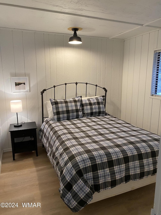 bedroom featuring light wood-style floors