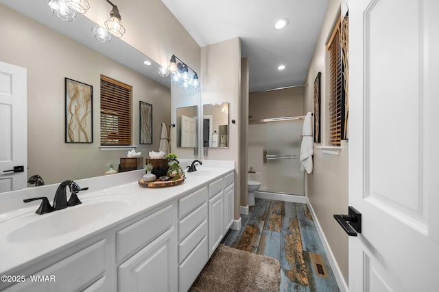 2870 W Lodgepole Ln, Show Low, AZ 85901 - full bath featuring toilet, double vanity, an enclosed shower, baseboards, and recessed lighting