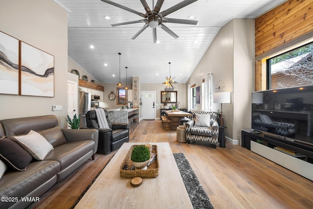 2870 W Lodgepole Ln, Show Low, AZ 85901 - living room featuring healthy amount of natural light, light wood-style flooring, a ceiling fan, wooden ceiling, and recessed lighting