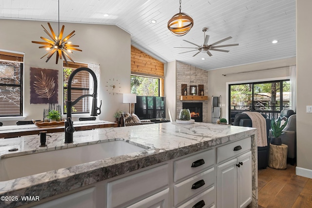 2870 W Lodgepole Ln, Show Low, AZ 85901 - kitchen with a sink, open floor plan, lofted ceiling, wooden ceiling, and wood finished floors