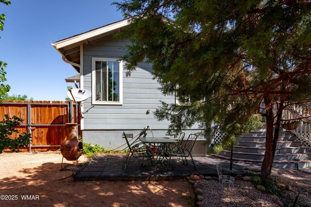 7431 N Gemini Ln, Lakeside, AZ 85929 - view of side of home featuring a patio area and stairway