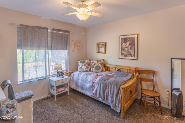 7431 N Gemini Ln, Lakeside, AZ 85929 - carpeted bedroom with baseboards and ceiling fan