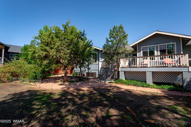 7431 N Gemini Ln, Lakeside, AZ 85929 - view of yard with a deck and stairway