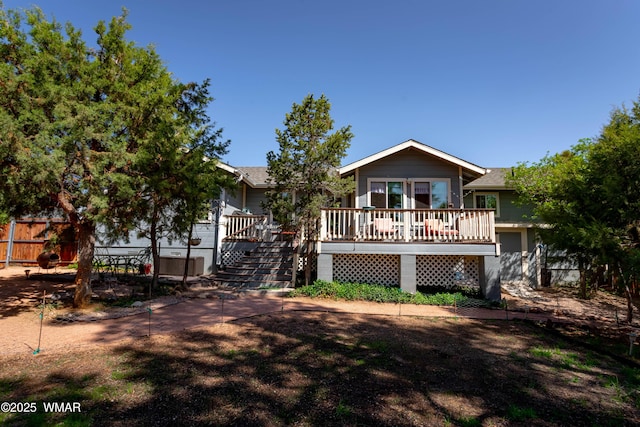 7431 N Gemini Ln, Lakeside, AZ 85929 - view of front of home featuring a wooden deck and stairs