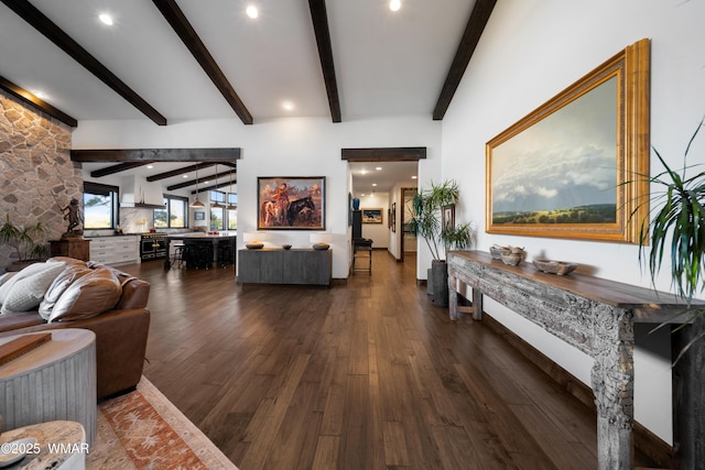 living room with dark wood-style floors and beam ceiling