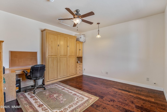 2335 Voyager Cir, Overgaard, AZ 85933 - office area with ceiling fan, dark wood-type flooring, and baseboards