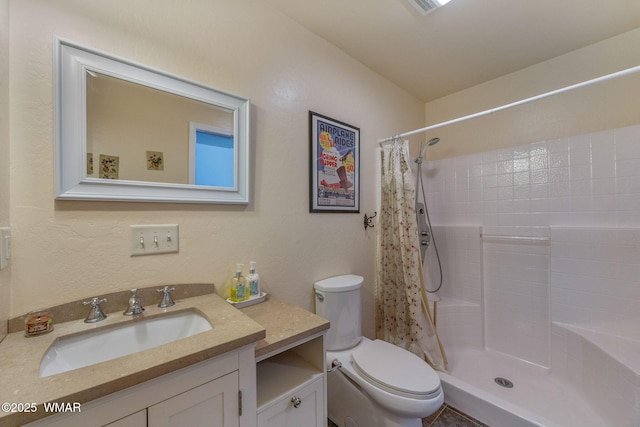 2335 Voyager Cir, Overgaard, AZ 85933 - bathroom featuring vanity, toilet, and a shower with shower curtain