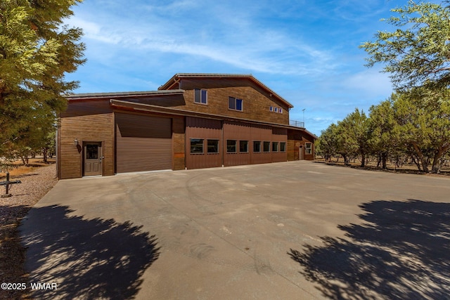 2335 Voyager Cir, Overgaard, AZ 85933 - view of side of home with driveway