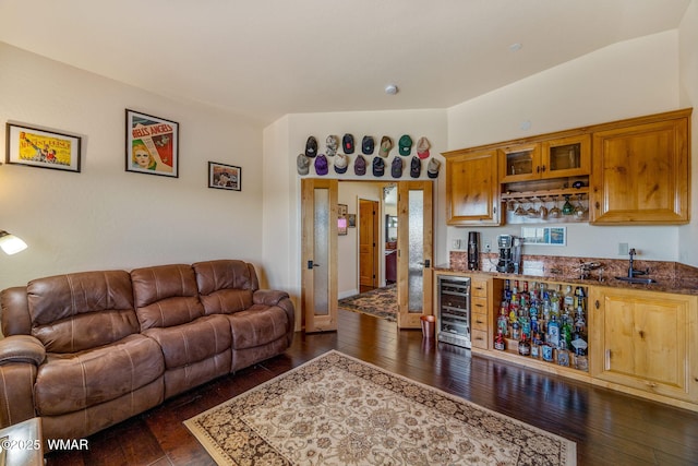 2335 Voyager Cir, Overgaard, AZ 85933 - living room featuring wine cooler, bar with sink, and dark wood-type flooring