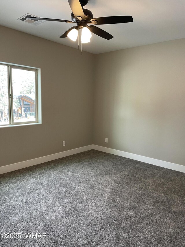 2426 Aspen Run, Pinetop, AZ 85935 - empty room with baseboards, ceiling fan, and dark carpet