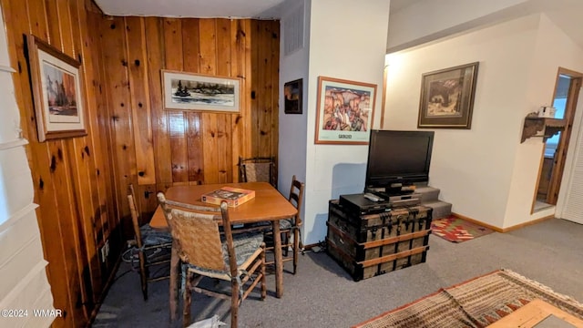 219 Yeager Ln, Lakeside, AZ 85929 - dining area with carpet floors and wooden walls