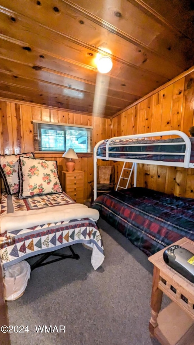 219 Yeager Ln, Lakeside, AZ 85929 - bedroom featuring wood walls, wooden ceiling, lofted ceiling, and carpet flooring
