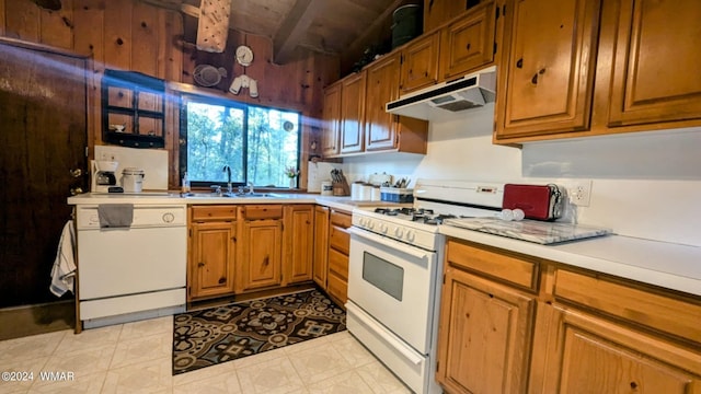 219 Yeager Ln, Lakeside, AZ 85929 - kitchen with white appliances, under cabinet range hood, light countertops, and brown cabinetry