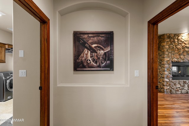 hall featuring wood finished floors