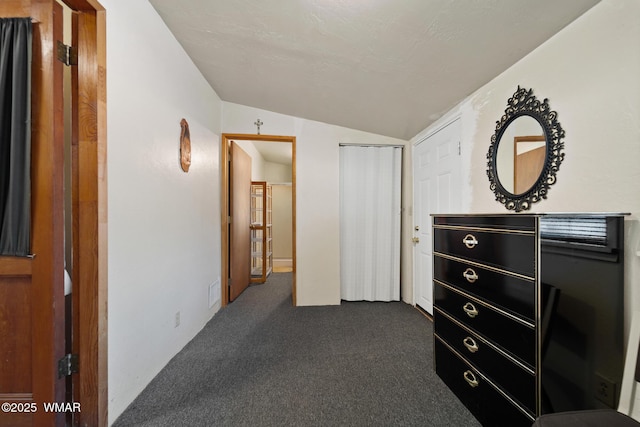 2681 W Reidhead, Show Low, AZ 85901 - bedroom featuring vaulted ceiling, dark carpet, and a closet