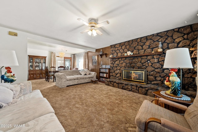 2681 W Reidhead, Show Low, AZ 85901 - living area with a fireplace, ceiling fan, carpet, and wooden walls