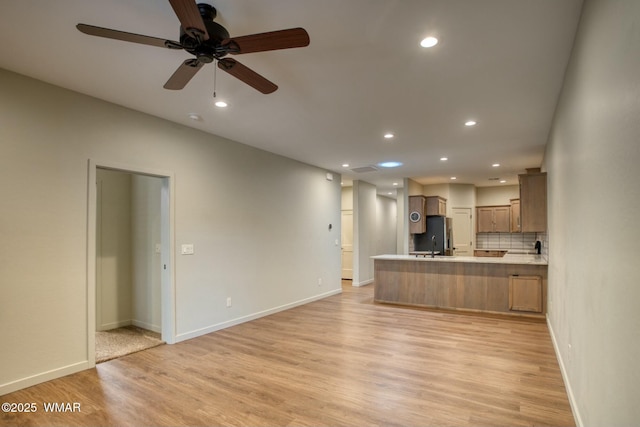6017 Saturn Dr, Lakeside, AZ 85929 - unfurnished living room featuring baseboards, light wood-type flooring, recessed lighting, and a ceiling fan