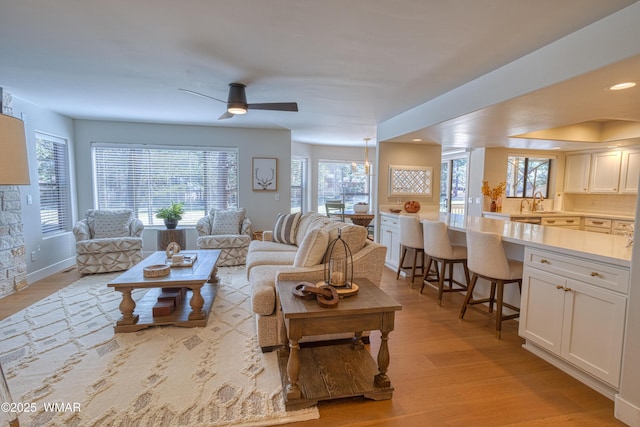 3651 Crown Dancer Dr Unit 8, Pinetop, AZ 85935 - living room with light wood finished floors, baseboards, recessed lighting, and a ceiling fan