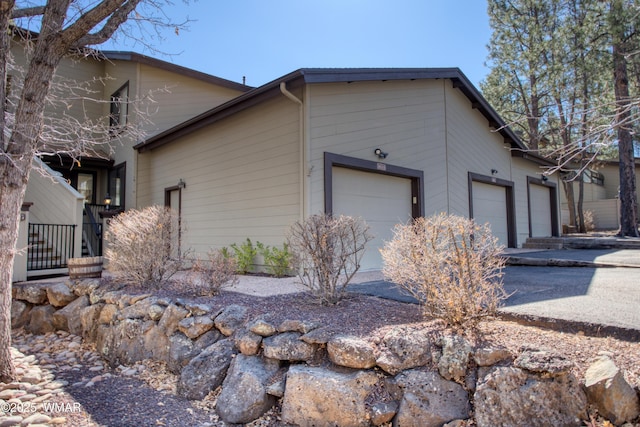 3651 Crown Dancer Dr Unit 8, Pinetop, AZ 85935 - view of property exterior featuring a garage